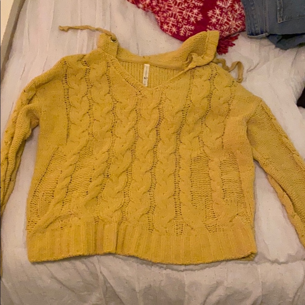 yellow hooded sweater